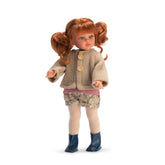 Red-haired doll in beige jacket, floral shorts, and blue boots from the ASI Dolls Jara Collection.