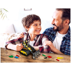 Father and son smiling while assembling the Alexander Ruspa construction set on a wooden table.