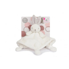 Beige rabbit baby comforter with soft ears on pink patterned background, ideal for newborns.