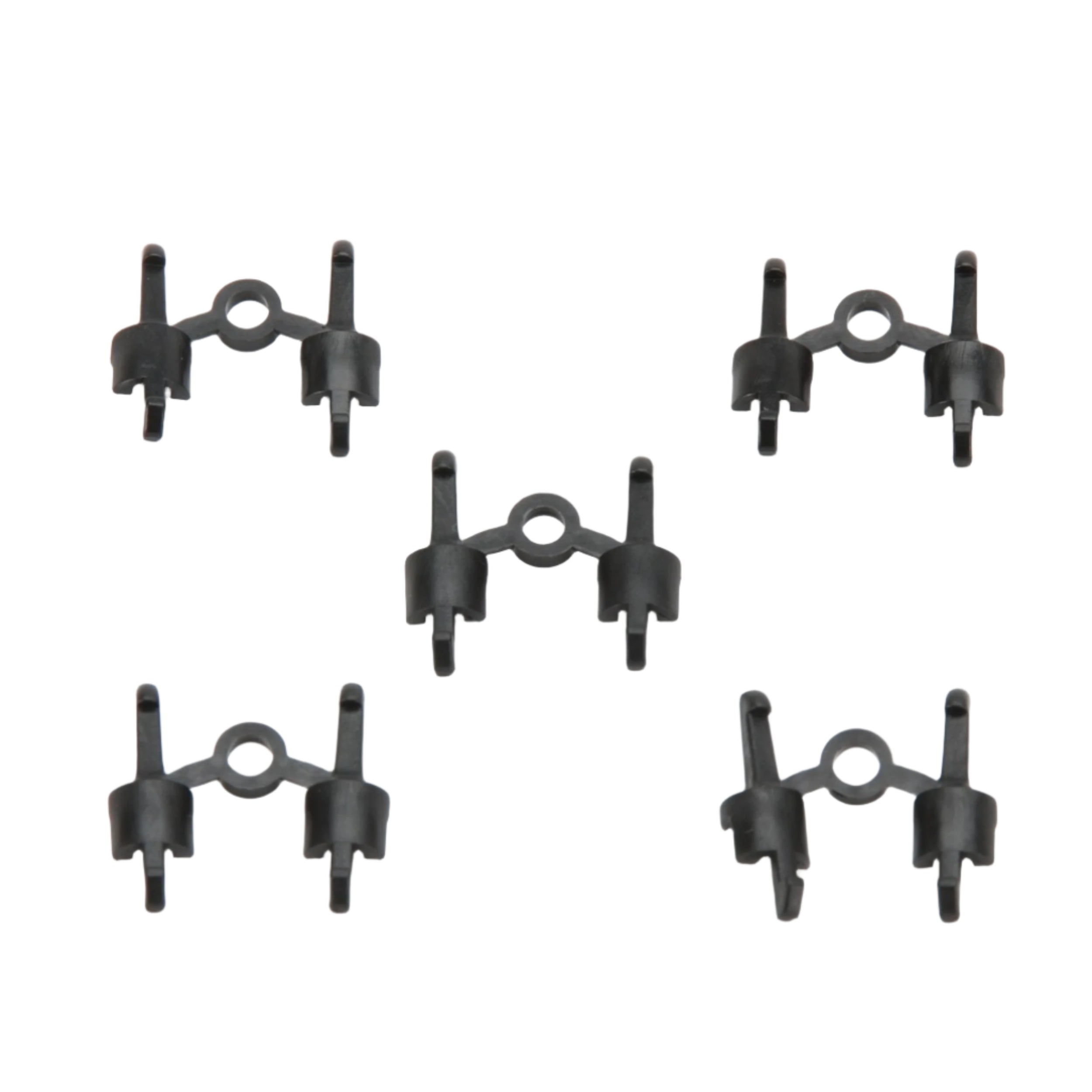 Five black spare couplings arranged in a pattern, compatible with Bruder toy vehicles.