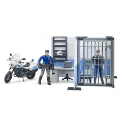 Police station playset with a bike, officer figure, desk, laptop, and jail cell with inmate figurine.