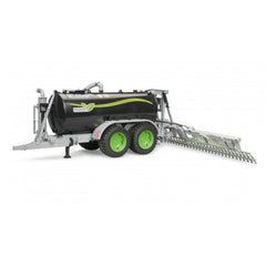 Bruder Fliegl Barrel Trailer toy, black tank with green accents, dual wheels, and rear hose distributor.
