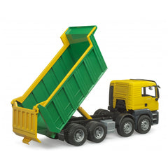 Yellow and green Bruder MAN TGS tipper truck toy with raised bed, showcasing realistic design and sturdy wheels.
