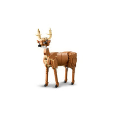 Posable LEGO Creator deer figure with brown and tan bricks, featuring antlers and a white underbelly, standing on four legs.