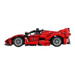 LEGO Ferrari FXX K model car kit in bright red, showcasing intricate details like butterfly doors and realistic wheels.