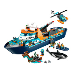 LEGO® City Arctic Explorer Ship construction set featuring a floatable ship, helicopter, dinghy, seven minifigures, and a whale.