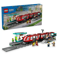 LEGO® City Downtown Streetcar and Station set featuring a vibrant red streetcar, detailed station, and various minifigures engaging in play.