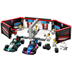 LEGO® City F1® Garage set featuring two F1® cars in their bays, a detailed garage with tools, tires, and minifigures of mechanics.