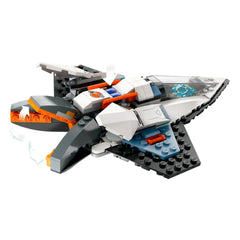 Interstellar spaceship construction set featuring a sleek, gray and white design with orange accents, winged thrusters, and blue details.
