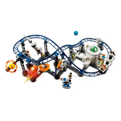 Colorful LEGO® Creator 3in1 Space Roller Coaster set featuring a winding blue track, a space rocket, and vibrant celestial decorations.