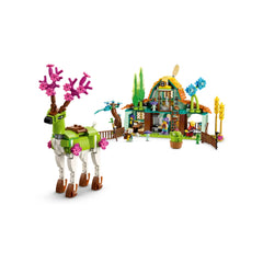 Colorful LEGO® DREAMZzz™ Stable of Dream Creatures set featuring a green dream creature with pink antlers and a whimsical cottage.