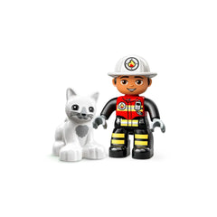 A smiling firefighter figure in a red and black suit stands next to a white cat, both set against a plain background.
