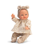 Charming 36 cm ASI Doll Alex with light eyes, wearing a floral top and bow headband, seated and waving.