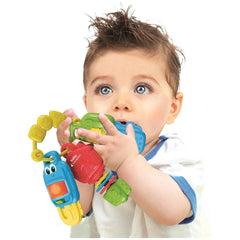 Baby Clementoni multi-activity keys toy held by a toddler with blue eyes, featuring bright colors and a playful design.