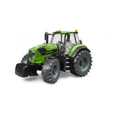 Bright green Bruder Deutz 8280 TTV toy tractor with rugged tires and glazed cab, angled view.