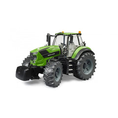 Bright green Bruder Deutz 8280 TTV toy tractor with rugged tires and glazed cab, angled view.