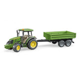 Green John Deere 5115 M toy tractor with tipping trailer, featuring realistic details and detachable front weight.