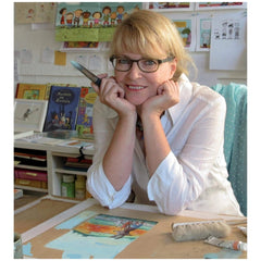 CARLSEN educational toy featuring a woman with glasses creating artwork with a paintbrush and knife on a wooden desk.