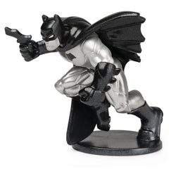 DC Comics BATMAN collectible mini figure in a dynamic pose, featuring a glossy black costume with white highlights.