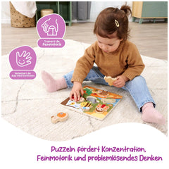 Eichhorn Bee-Happy Sensory Puzzle is being explored by a focused child on a shaggy rug, showcasing vibrant colors and engagin