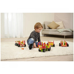 Eichhorn Constructor Truck set with 135 colorful pieces is being played with by a focused child on a soft white rug.
