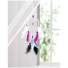 Dreamcatcher set featuring a white frame, pink and blue center, and tassels of pink, blue, and black feathers.