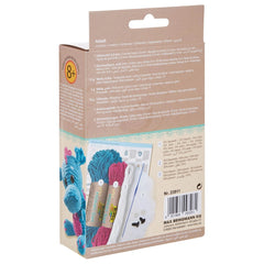 Folia Mini Crochet Kit features a blue and pink crochet hook, two yarn spools, and Arabic text on matte cardboard packaging.