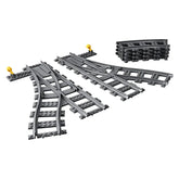 LEGO® City Switch Tracks set featuring four curved tracks and one left and right switch track in gray, designed for expanding train layouts.