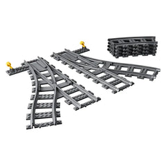 LEGO® City Switch Tracks set featuring four curved tracks and one left and right switch track in gray, designed for expanding train layouts.