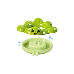Bright green turtle floatie toy with a smiling face, featuring a circular base for interactive water play.