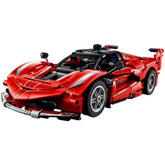 LEGO Ferrari FXX K model car kit, featuring a striking red design with white stripes, detailed wheels, and an aerodynamic structure.