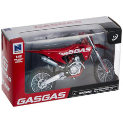Gasgas Mc 450F dirt bike 1:12 die cast model in red packaging with transparent window, featuring warning labels and brand nam