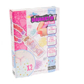 Nice Diamantiny Deco Charms Set features glossy pink packaging with diamond patterns and vibrant purple printed text.