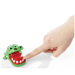 Noris Mini Crocodile Game toy alligator with hand pressing its mouth, colorful design ideal for childrens playtime.