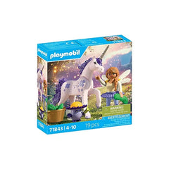Playmobil Magic Unicorns playset features a glossy box with a white and purple unicorn, doll, flowers, and green grass.