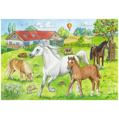 Ravensburger puzzle features a vibrant pastoral scene with various animals, a red barn, and a green field.