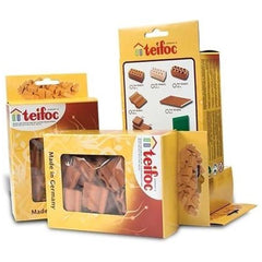 Teifoc garage door packaging features glossy yellow cardboard with designs and German text, arranged for display.