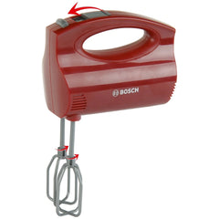 Theo Klein Bosch handmixer in glossy red and silver plastic with handle, spout, mixing blades, and visible "BOSCH" logo.