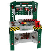 Theo Klein Bosch workbench features 77 plastic tool bits in a green, yellow, and black layout with brown handles and red acce