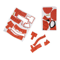 4D Build Marvel Spider-Man 3D puzzle model kit featuring red and white plastic pieces in various shapes on a white background