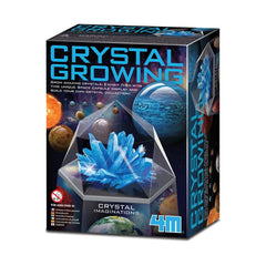 4M Crystal Growing Blue Edition toy playset in glossy cardboard packaging with clear plastic window and blue-white design.
