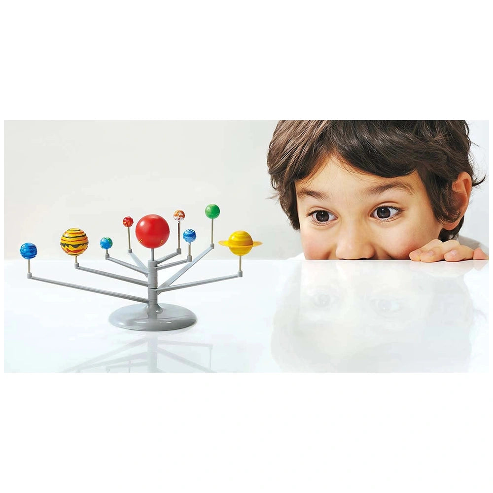 KidzLabs Planetarium features a metallic structure with colorful spheres, partially obscured by a child's face behind a trans