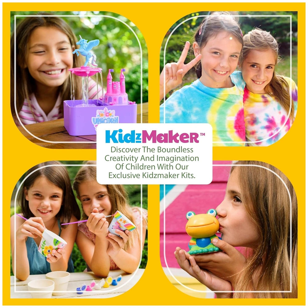 4M Make Your Own Pom Pom kit showcased by two young girls in colorful shirts, smiling while holding a toy frog outdoors.