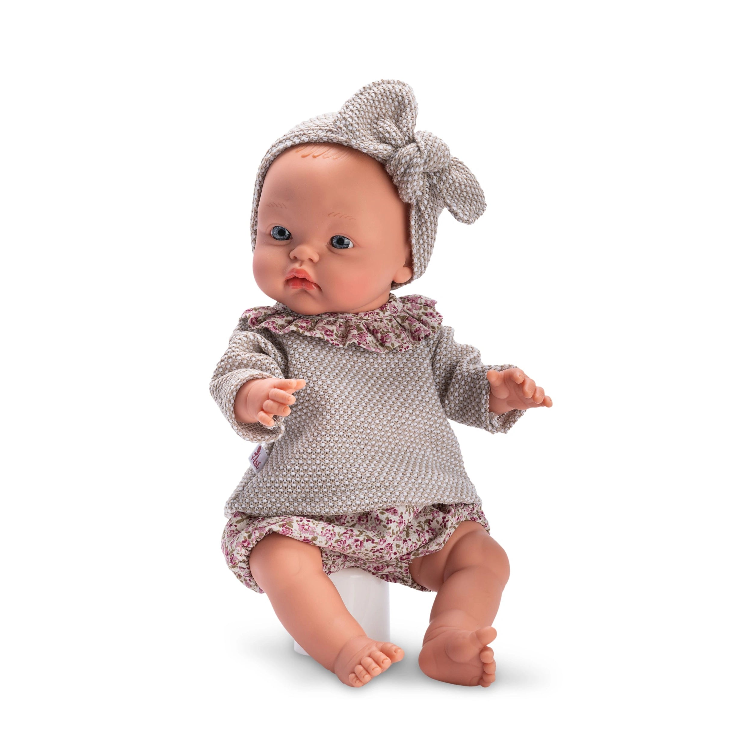 Asi Dolls 36 cm Alex wearing grey outfit with headband, sitting against white background.