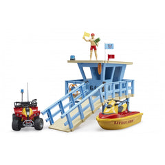 Lifeguard station playset with quad bike, lifeguard tower, and yellow-red personal watercraft.