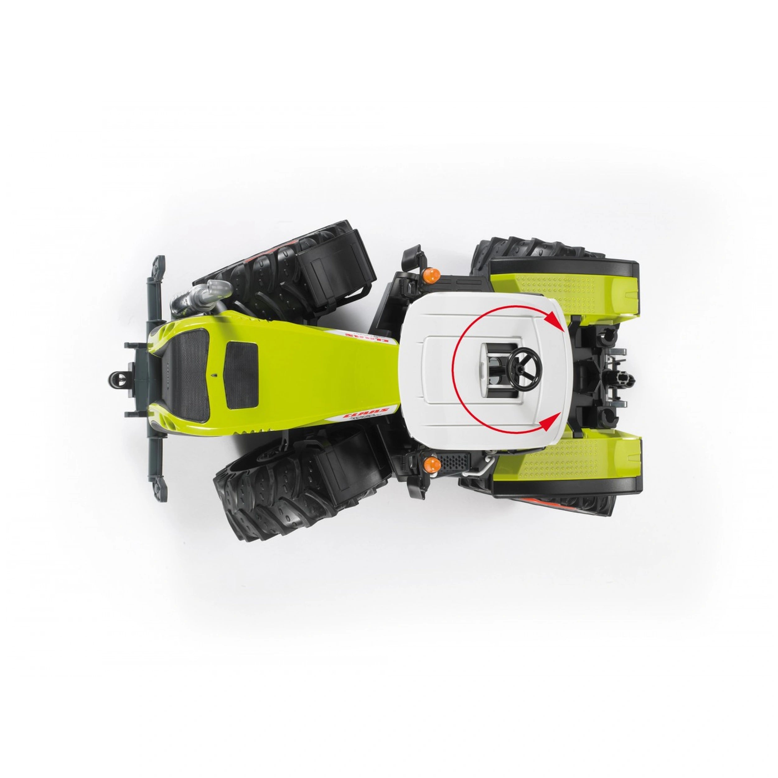 Top view of a Bruder Claas Xerion 5000 toy tractor in green and white, with large black tires and a rotating cab.