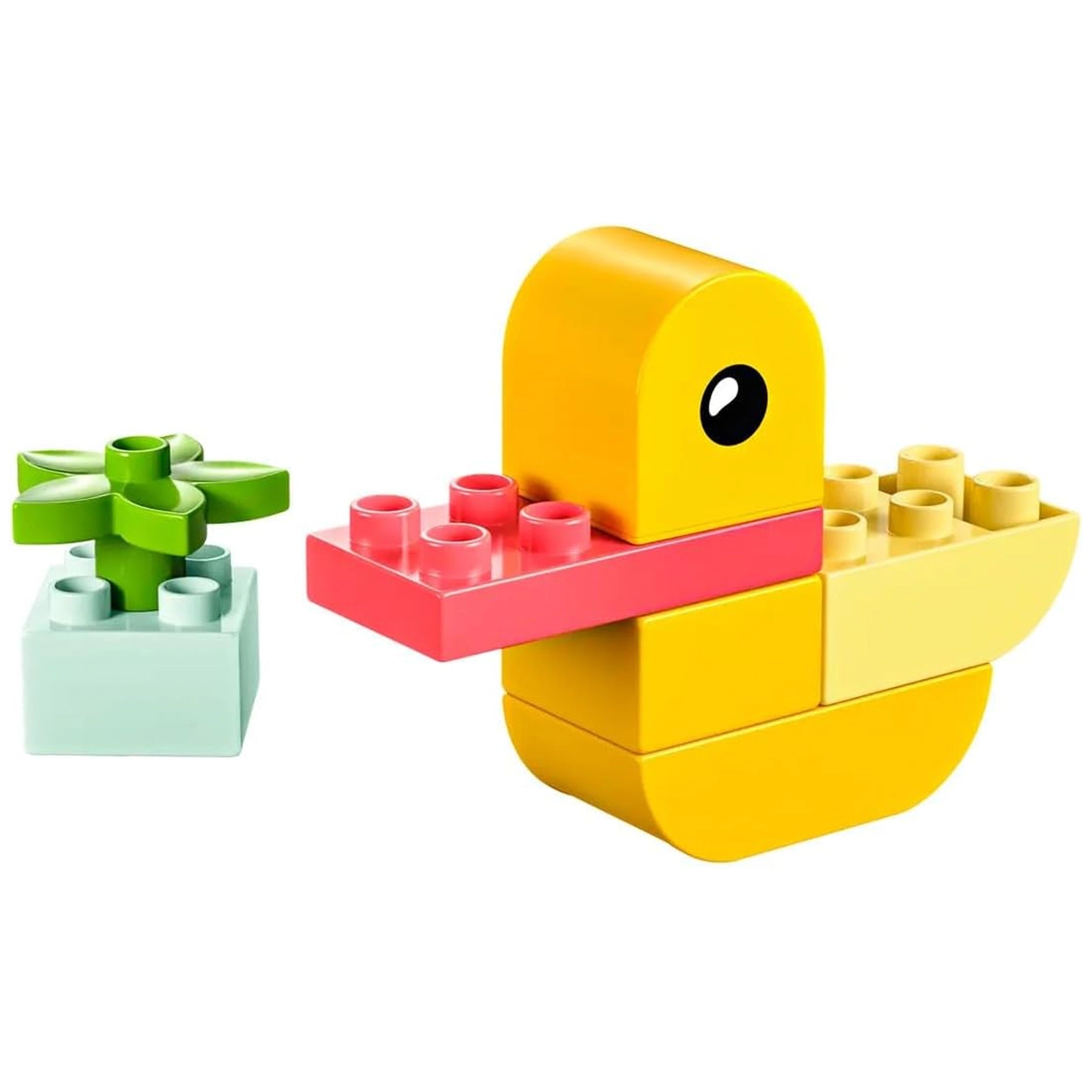 Colorful LEGO DUPLO duck toy in yellow with a red beak, next to a green plant in a light blue pot, perfect for creative play.