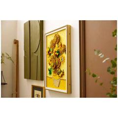 LEGO Art Vincent van Gogh Sunflowers wall art set features vibrant yellow flowers with different shades, displayed elegantly in a frame.