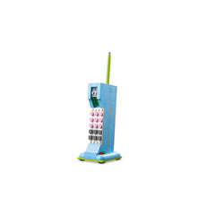 Retro LEGO construction set resembling a vintage telephone, featuring a blue body, pink buttons, and a green antenna, designed for creative play.