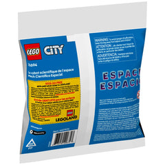 LEGO City Space Science Mech construction set packaging features a blue background with multilingual warnings and promotional text.